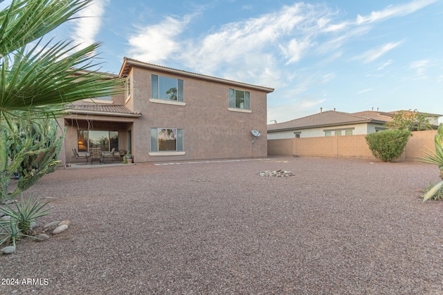 rear view of house featuring a patio area