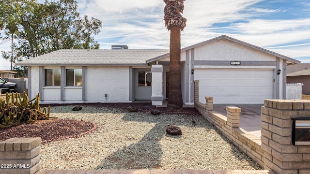 single story home with a garage