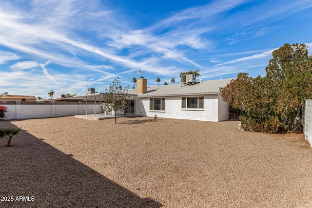 back of house featuring a patio area