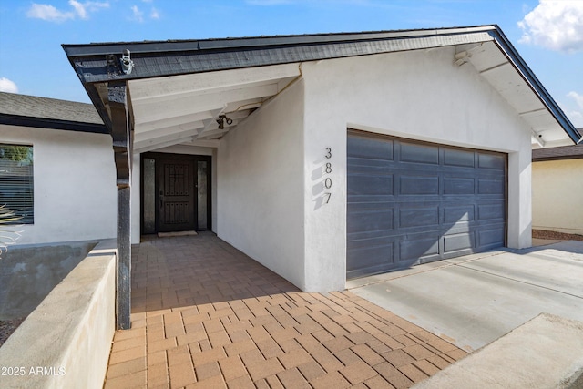 exterior space with a garage