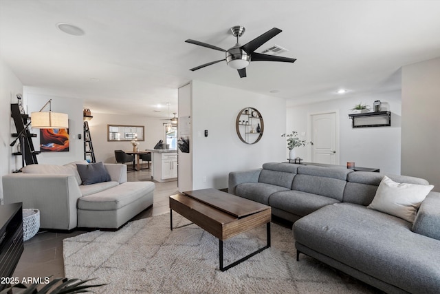 living room with ceiling fan