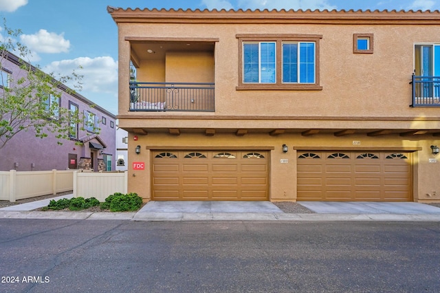 view of front of property with a garage