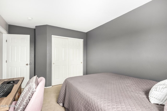 carpeted bedroom featuring a closet