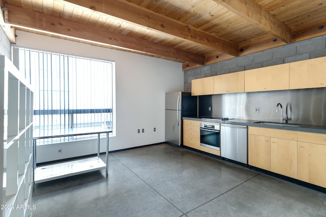 kitchen with light brown cabinets, stainless steel appliances, beamed ceiling, and sink