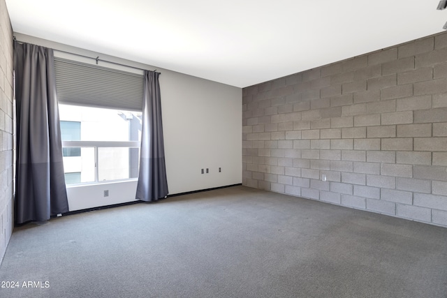 empty room with light colored carpet