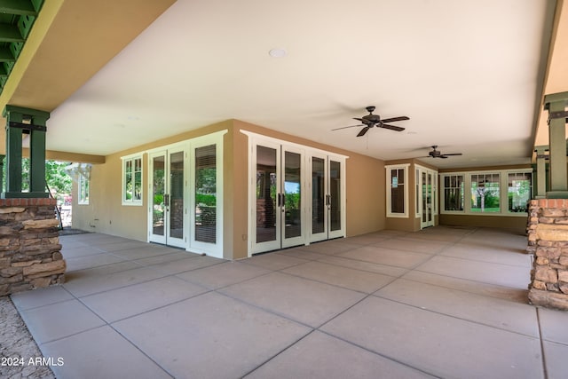 view of patio with ceiling fan and french doors