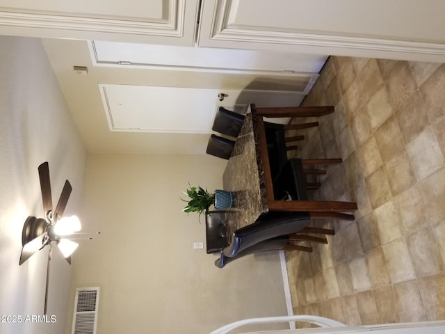 6011 N 33rd Ave, Phoenix, AZ 85017 - unfurnished dining area with stairway