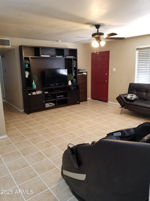 6011 N 33rd Ave, Phoenix, AZ 85017 - living room featuring a ceiling fan, light tile patterned floors, and baseboards
