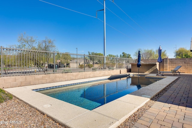 view of pool featuring fence and a fenced in pool