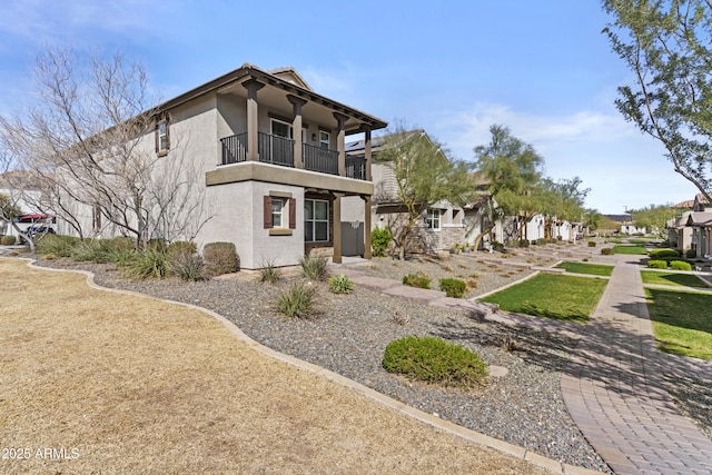 exterior space featuring a balcony