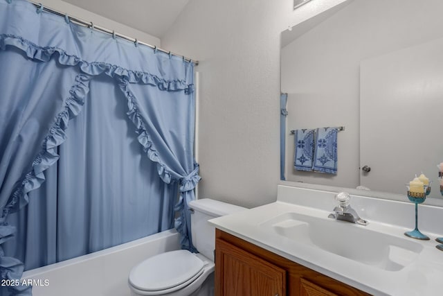 full bathroom with shower / tub combo, vanity, and toilet