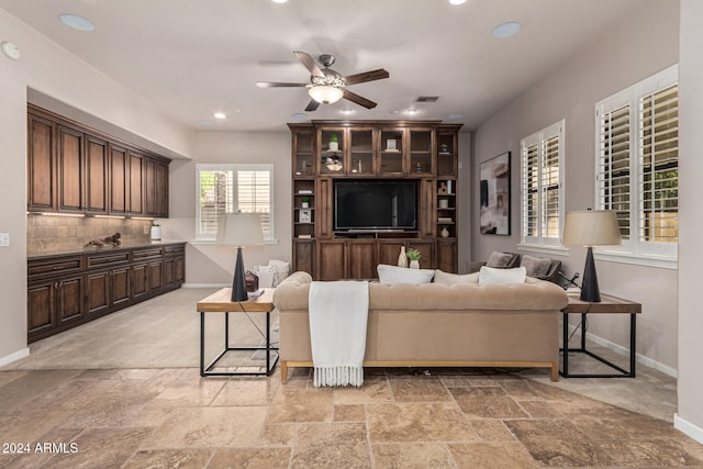 living room with ceiling fan