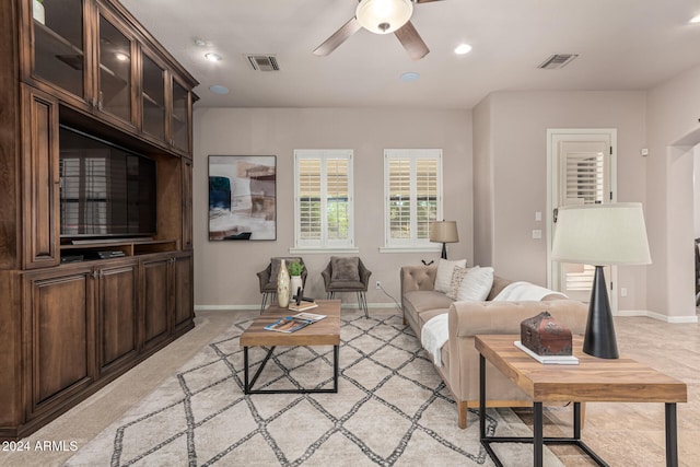 living room with ceiling fan