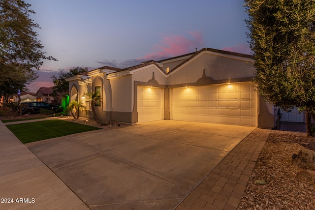 view of front of property with a garage