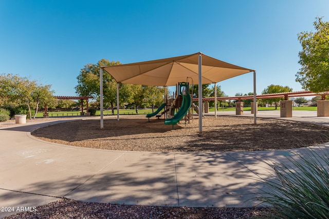 view of playground featuring a pergola