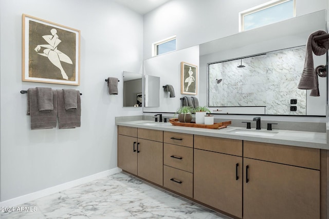 bathroom with a shower and vanity