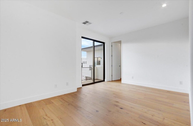 100 W Northern Ave Unit 17, Phoenix, AZ 85021 - empty room featuring light wood-type flooring, baseboards, and visible vents