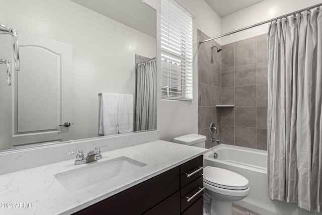 full bathroom with vanity, toilet, and shower / bath combination with curtain