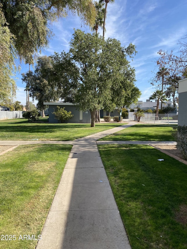 surrounding community featuring a lawn