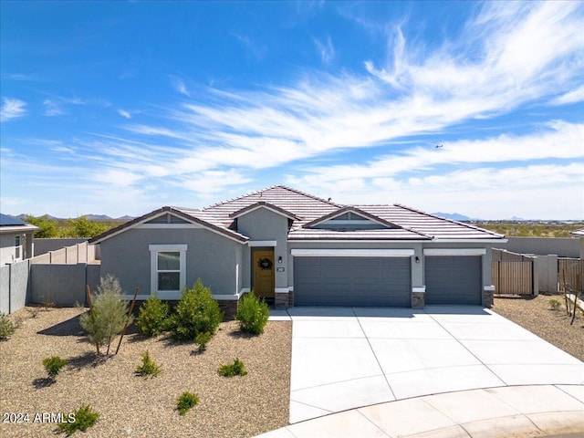 view of front of home with a garage