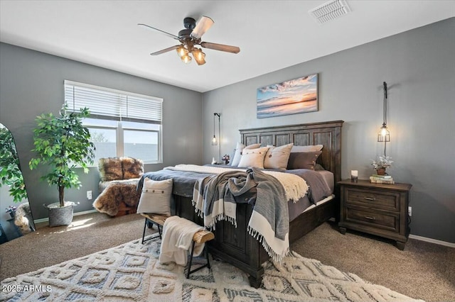 carpeted bedroom featuring ceiling fan