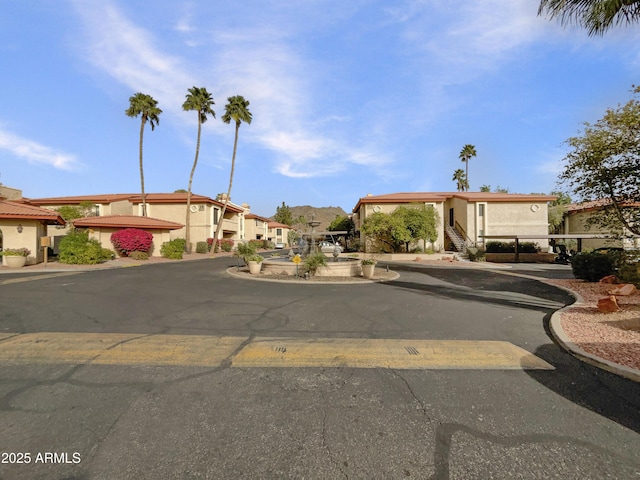 view of street featuring curbs