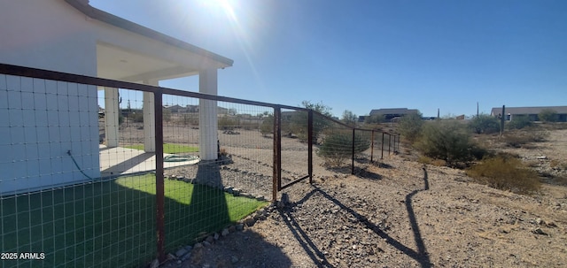 view of yard with a rural view