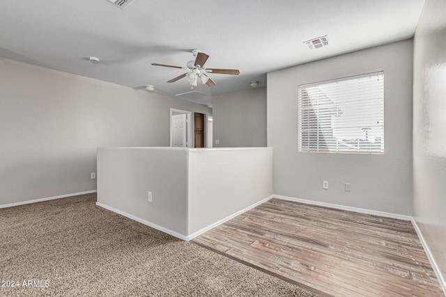 empty room featuring hardwood / wood-style flooring