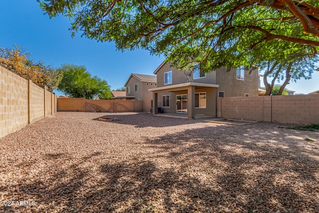 rear view of house featuring a patio area