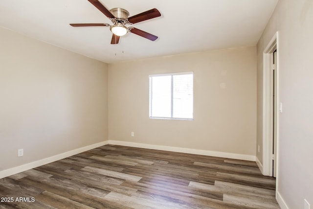 9622 N 35th Ln, Phoenix, AZ 85051 - unfurnished room with dark wood finished floors and a ceiling fan
