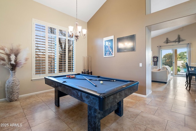 rec room with vaulted ceiling, a chandelier, and billiards