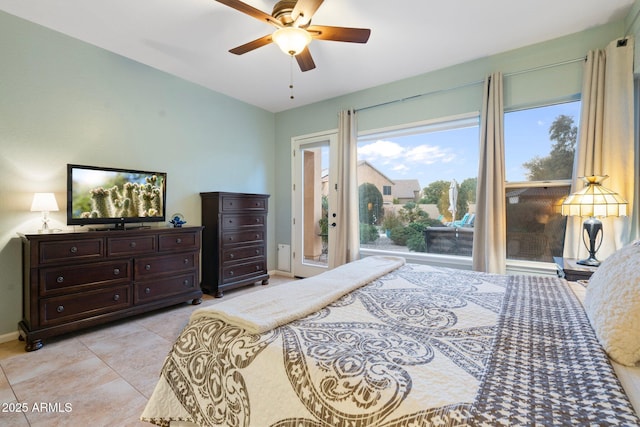 bedroom featuring light tile patterned flooring and ceiling fan