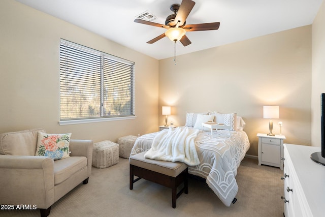 carpeted bedroom with ceiling fan