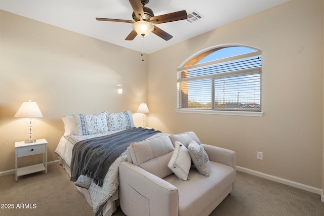 bedroom featuring ceiling fan and carpet