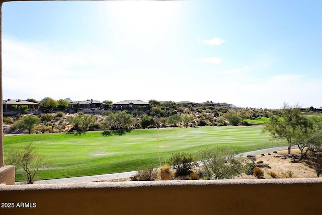 view of community featuring a yard