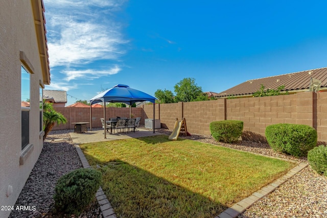 view of yard with a patio and a gazebo