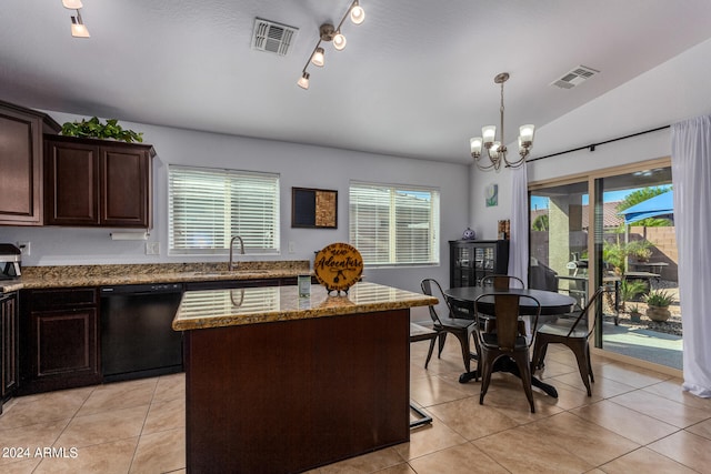 kitchen featuring pendant lighting, dishwasher, a center island, sink, and an inviting chandelier