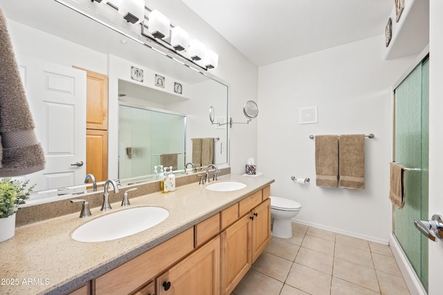 full bathroom featuring a sink, baseboards, and a stall shower