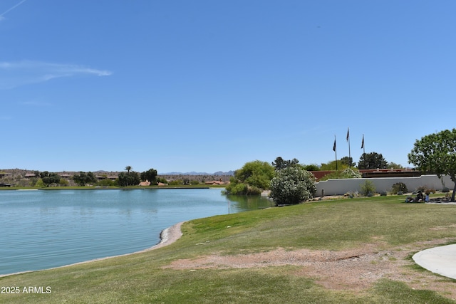 view of water feature with fence