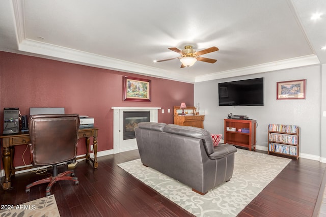 living room featuring crown molding, ceiling fan, and dark hardwood / wood-style flooring