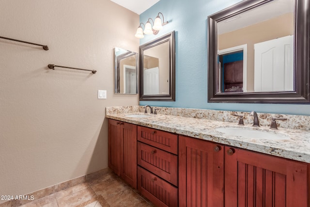 bathroom featuring vanity and tile patterned floors