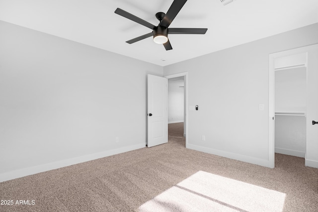 641 W Oriole Way, Chandler, AZ 85286 - unfurnished bedroom with carpet floors, a spacious closet, and ceiling fan