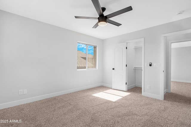 641 W Oriole Way, Chandler, AZ 85286 - unfurnished bedroom featuring carpet flooring, a walk in closet, ceiling fan, and a closet