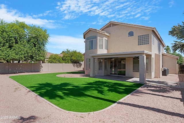 641 W Oriole Way, Chandler, AZ 85286 - back of property featuring a fenced backyard, stucco siding, and a patio area
