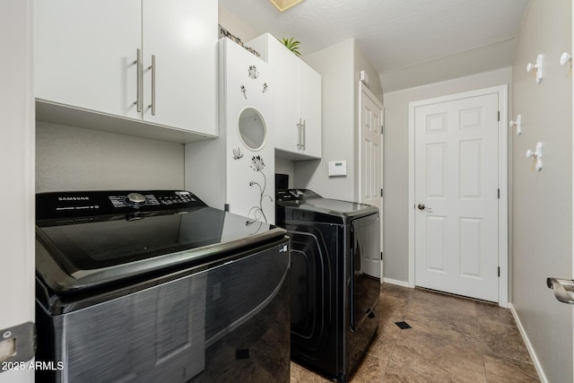 565 E Rosebud Dr, San Tan Valley, AZ 85143 - clothes washing area featuring baseboards, cabinet space, and separate washer and dryer