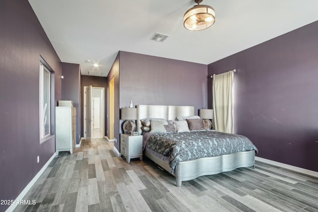 bedroom featuring light wood-type flooring