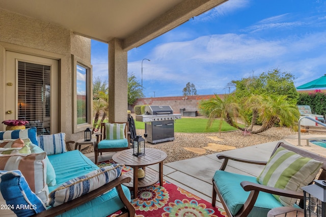 view of patio with a grill