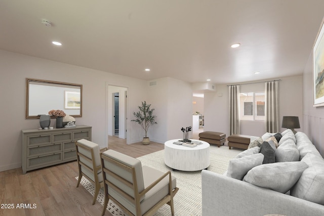 5132 N 83rd St, Scottsdale, AZ 85250 - living room with light wood-style flooring, recessed lighting, and baseboards