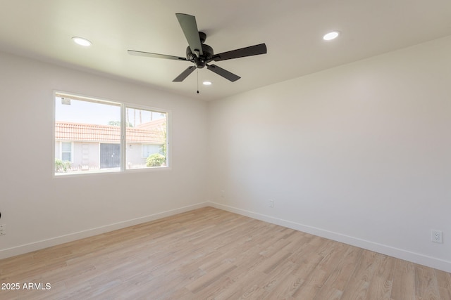 5132 N 83rd St, Scottsdale, AZ 85250 - spare room with light wood-style flooring, recessed lighting, a ceiling fan, and baseboards