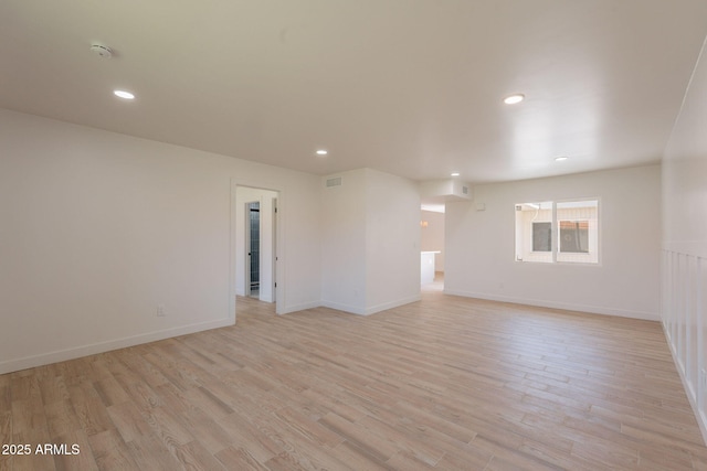 5132 N 83rd St, Scottsdale, AZ 85250 - unfurnished room with light wood finished floors, recessed lighting, baseboards, and a smoke detector